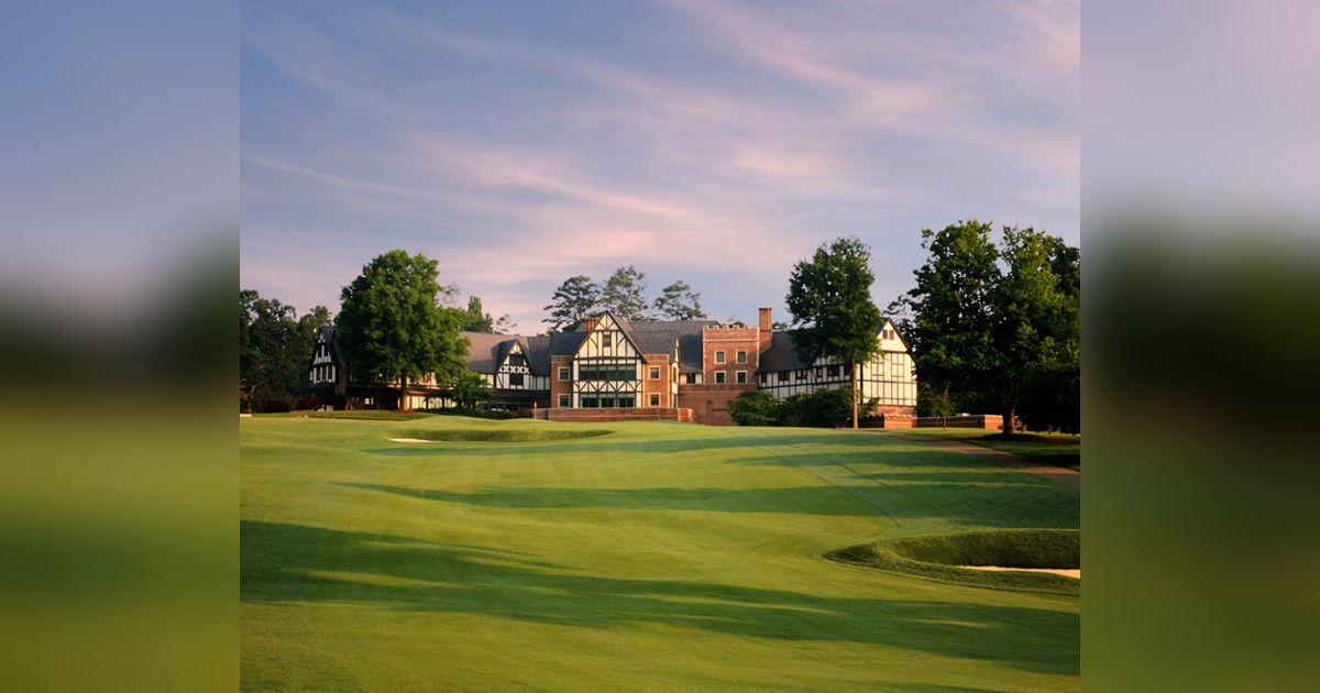 Sedgefield Country Club clubhouse beyond the ninth fairway